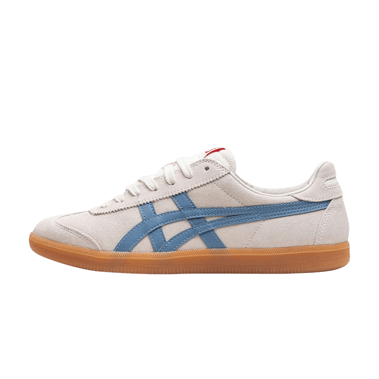 Onitsuka Tiger Tokuten White Blue Gum, zijaanzicht van sneaker met crème canvas, blauw streepdetail, gumzool