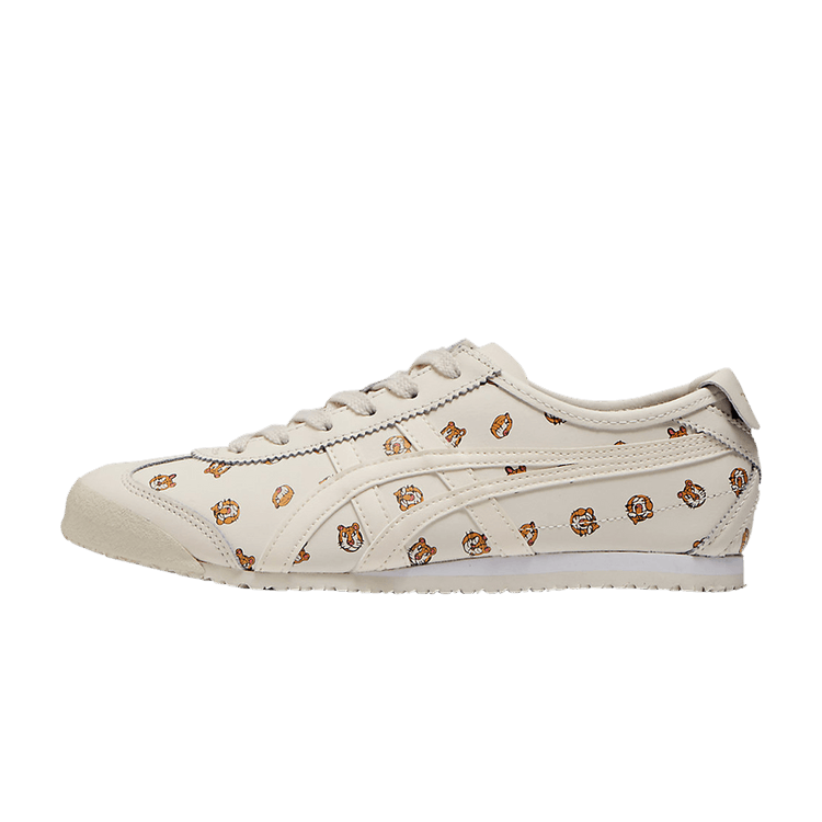 Onitsuka Tiger Mexico 66 Cream, zijaanzicht met crème leren upper en allover bruin logo-print, witte zool