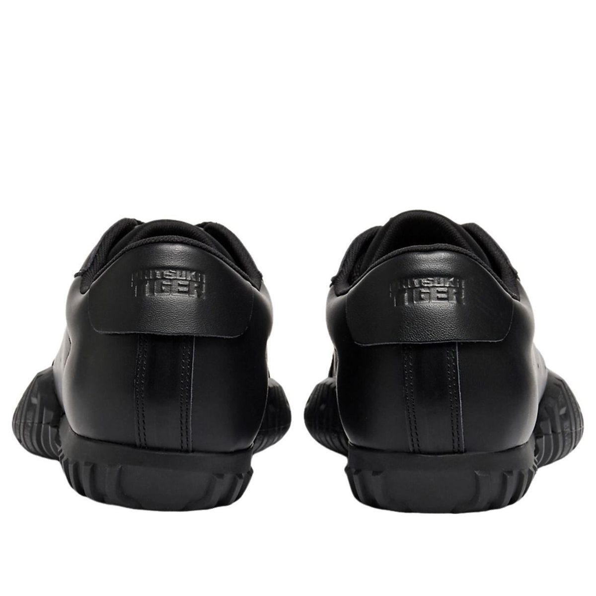 Onitsuka Tiger Duck Tiger TR Black, achteraanzicht met logo op hak en gestruttureerde achterkant