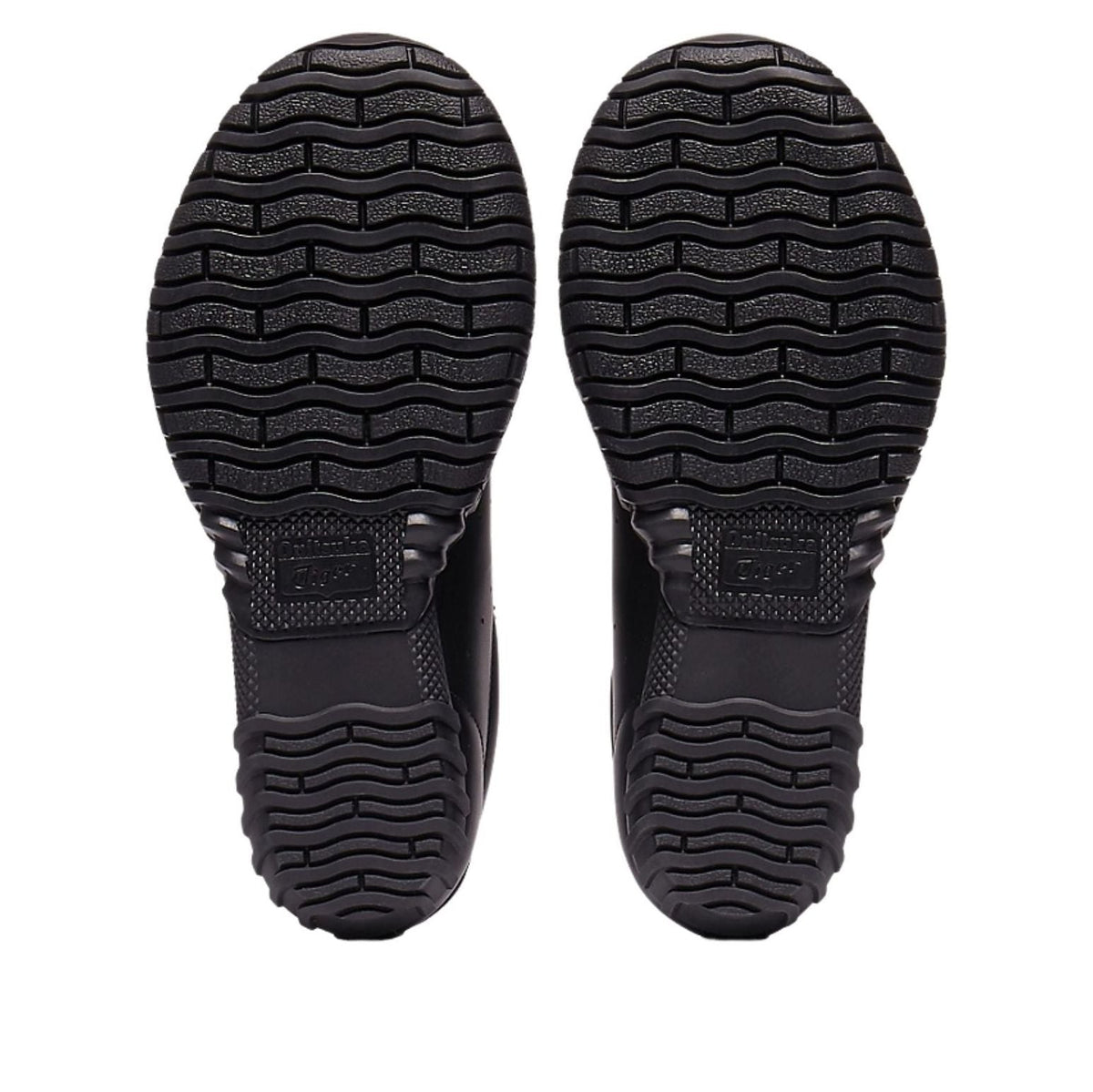 Onitsuka Tiger Duck Tiger TR Black, zoolprofiel met golvend patroon en textuur
