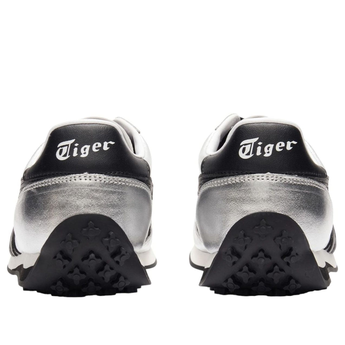 Onitsuka Tiger EDR 78 Pure Silver Black, detailfoto hakken met Tiger logo en reliëfpatroon op zwarte zool