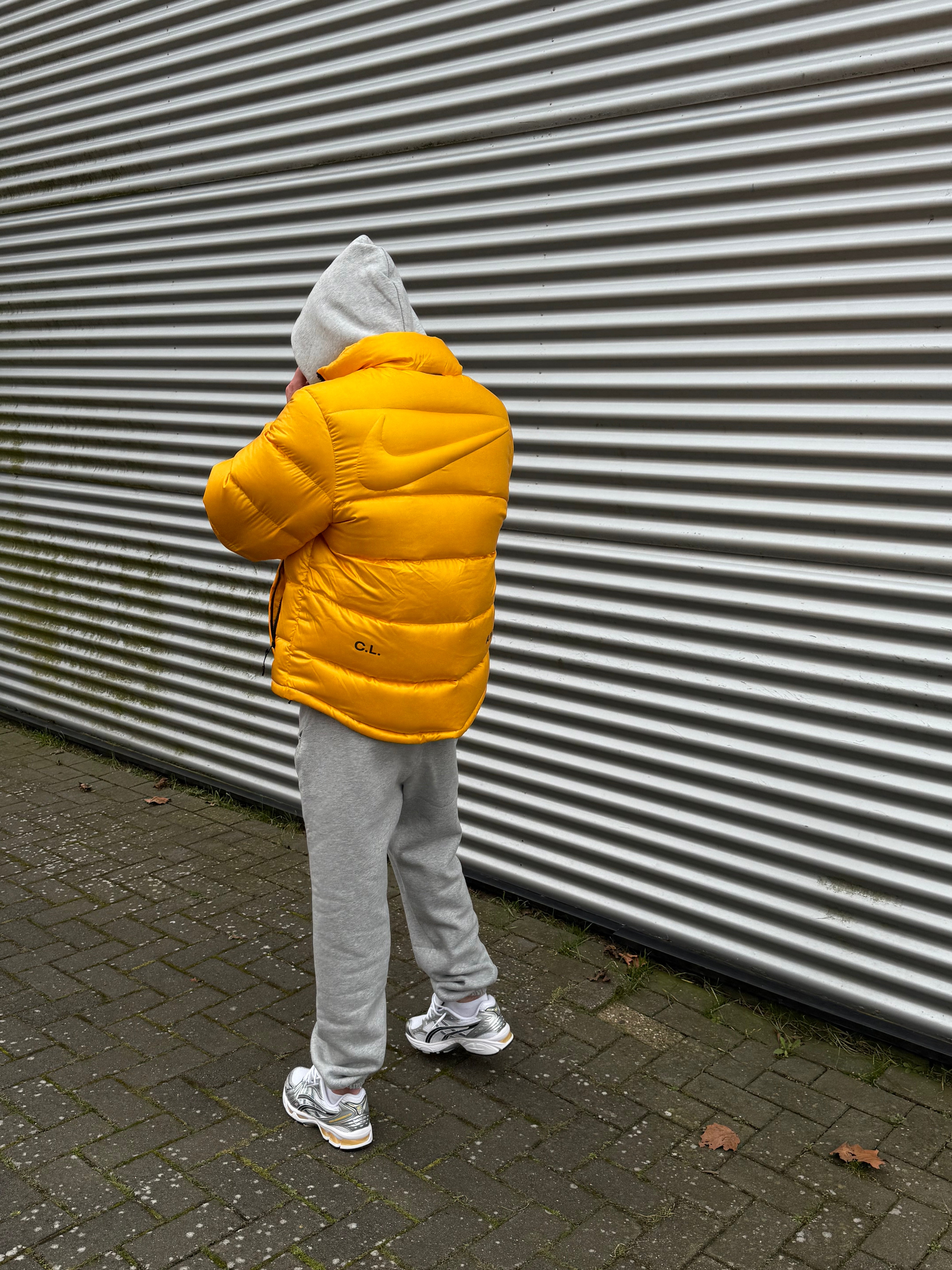 Nike x NOCTA Sunset Puffer Jacket Yellow