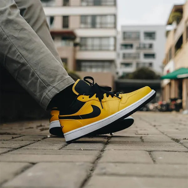 Jordan 1 Low University Gold