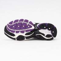 Saucony ProGrid Omni 9 White Black Silver Purple sneakers shown from below with black white and purple outsole detailing and textured traction pattern