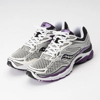 Saucony ProGrid Omni 9 White Black Silver Purple sneakers shown as a pair with white mesh uppers black and silver details purple accents and cushioned soles