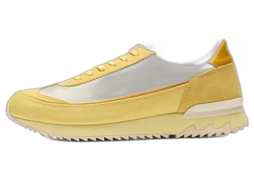 Onitsuka Tiger HSINTI Ivory Faded Yellow sneaker, zijaanzicht met geel canvas en wit-geel suède details
