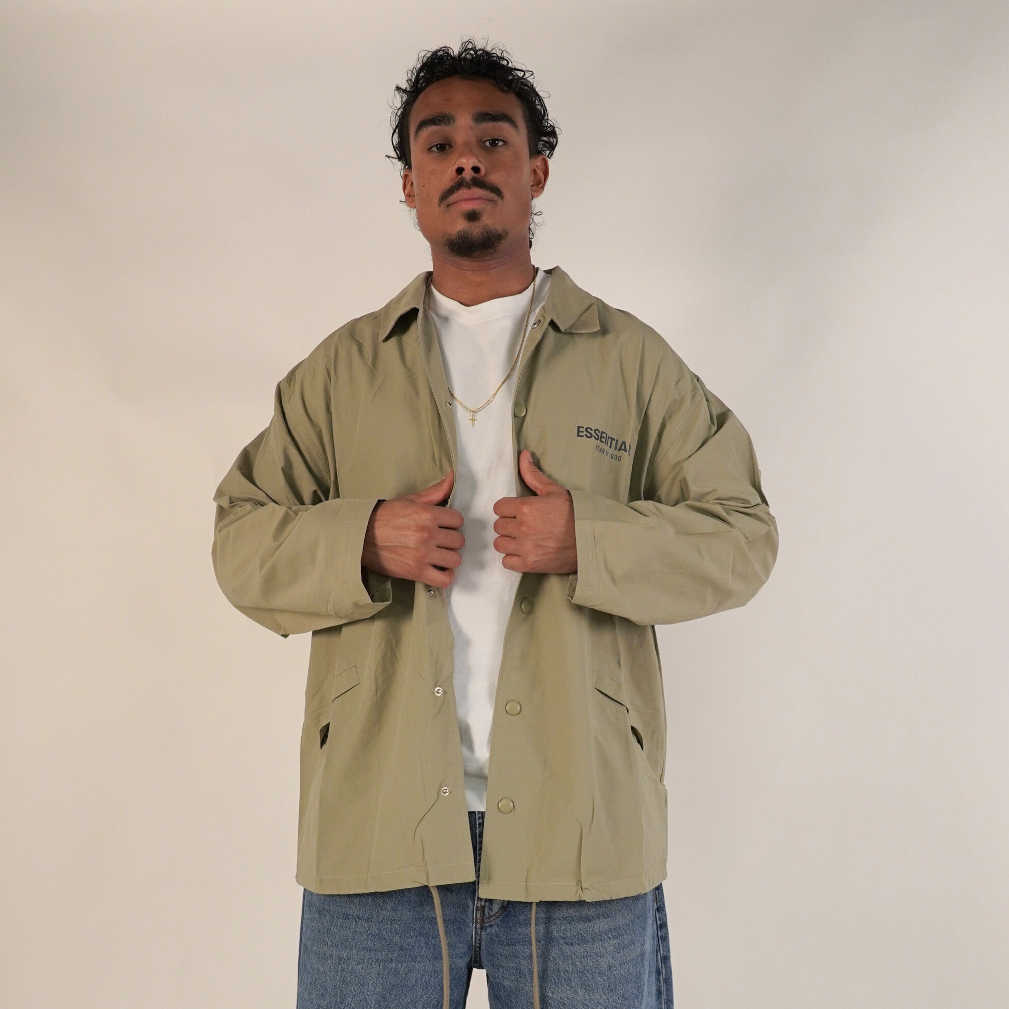 Fear of God Essentials FW20 Coach Jacket Sage | SneakerAsk