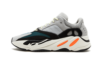 Adidas Yeezy Boost 700 V1 Wave Runner zijaanzicht, grijs mesh met zwart, teal en crèmekleurige vlakken